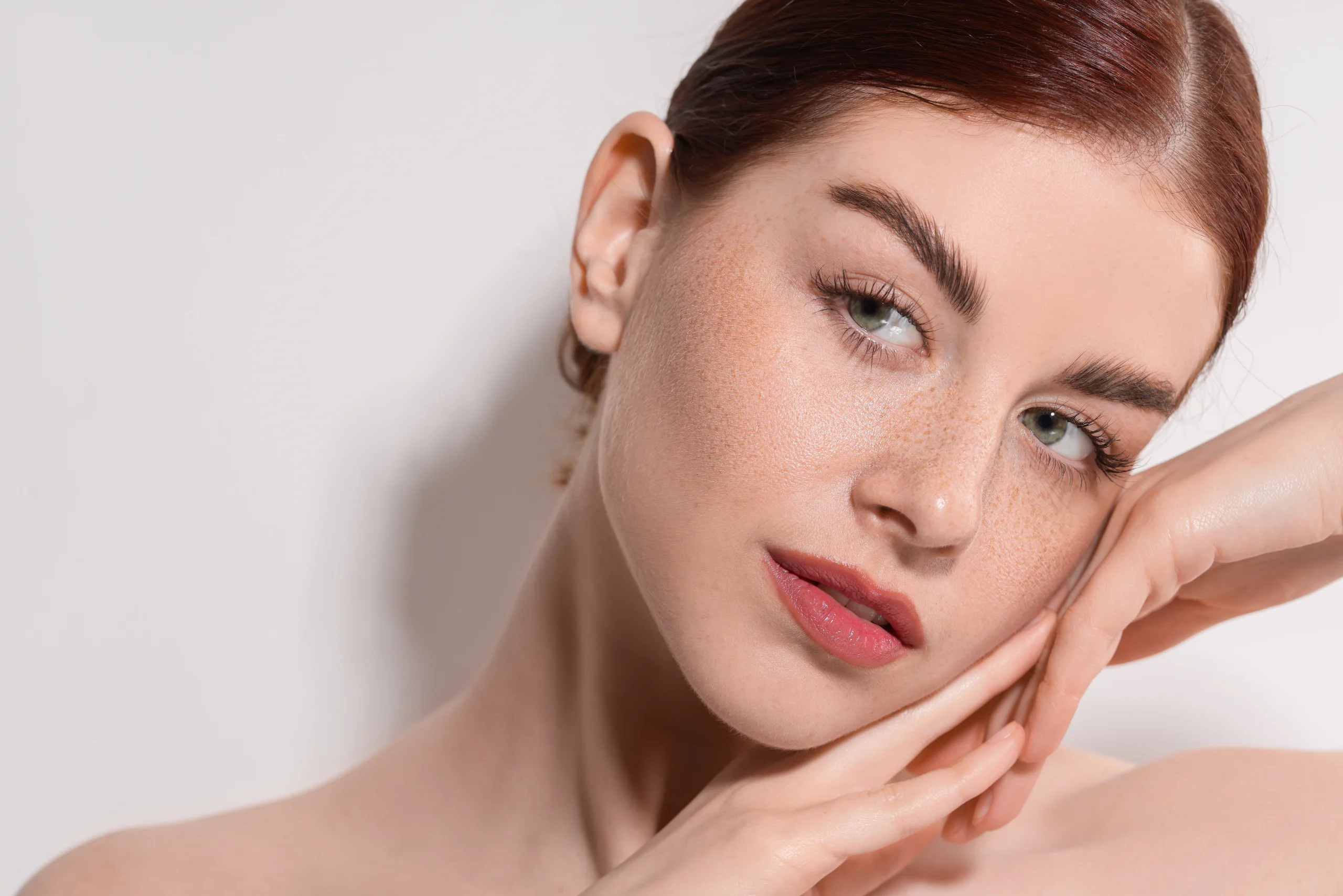 portrait-beautiful-woman-light-background-closeup